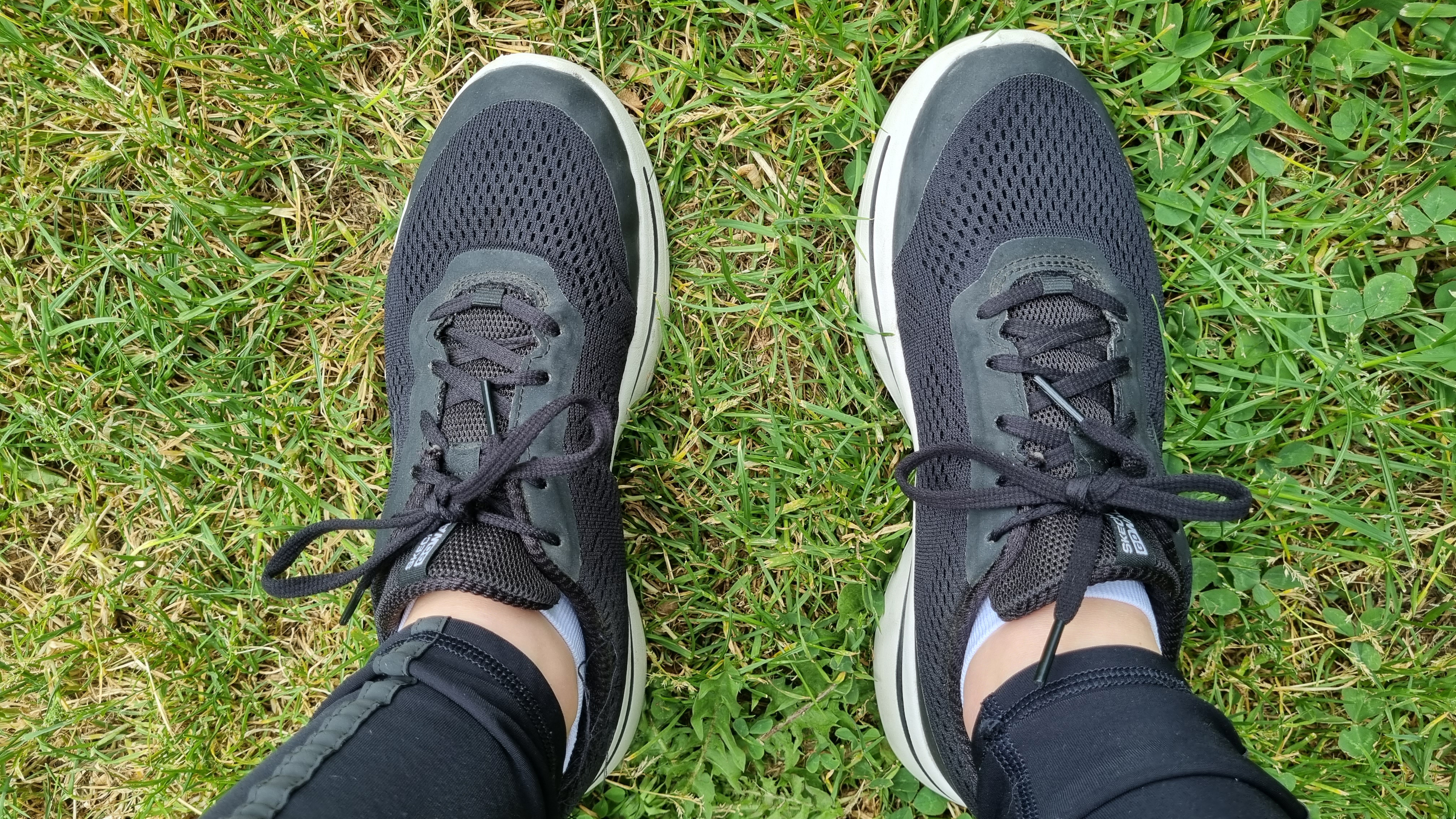 Skechers Go walk Arch Fit Motion Breeze on person's feet